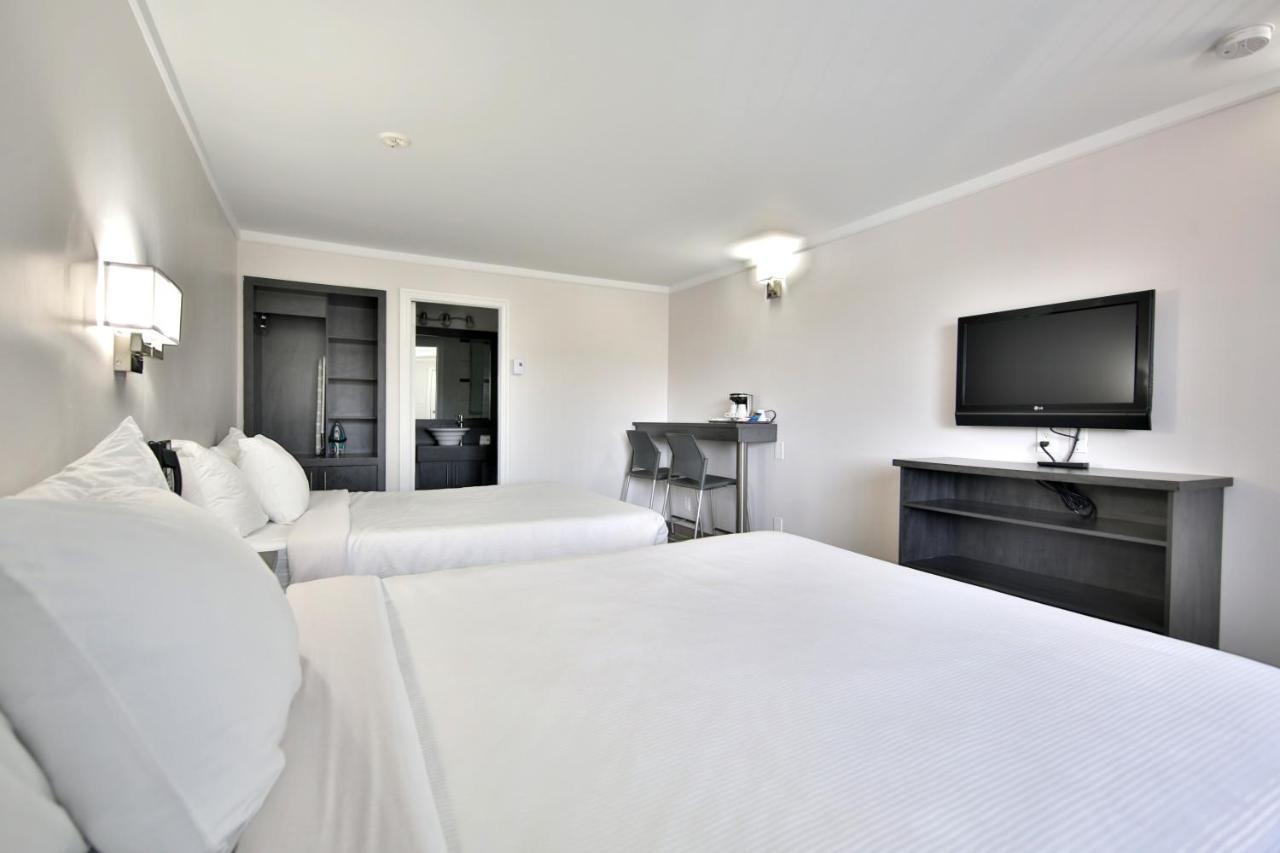Motel Newstar Laval Bagian luar foto